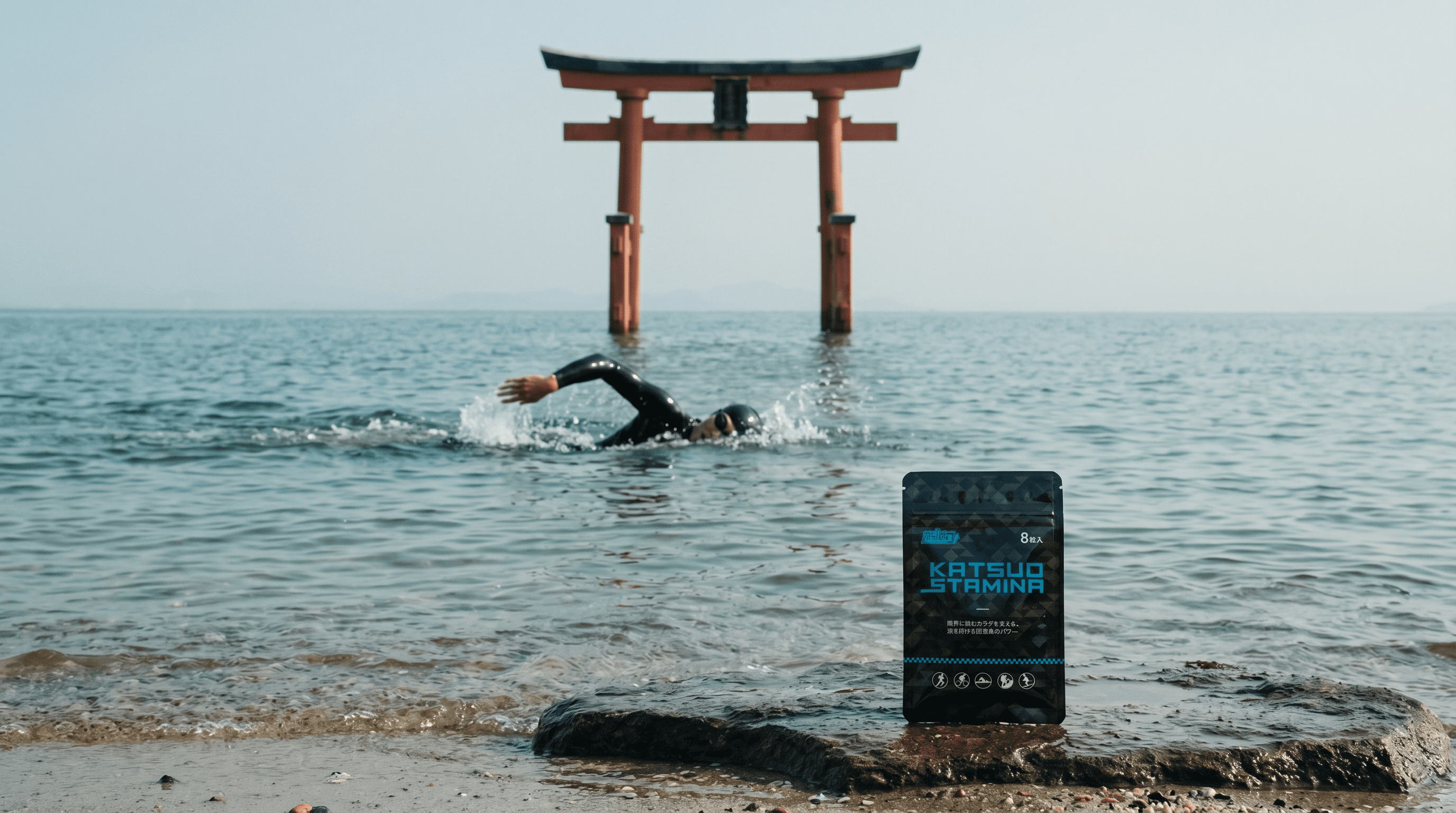 Open-water swim past a torii gate at first light
